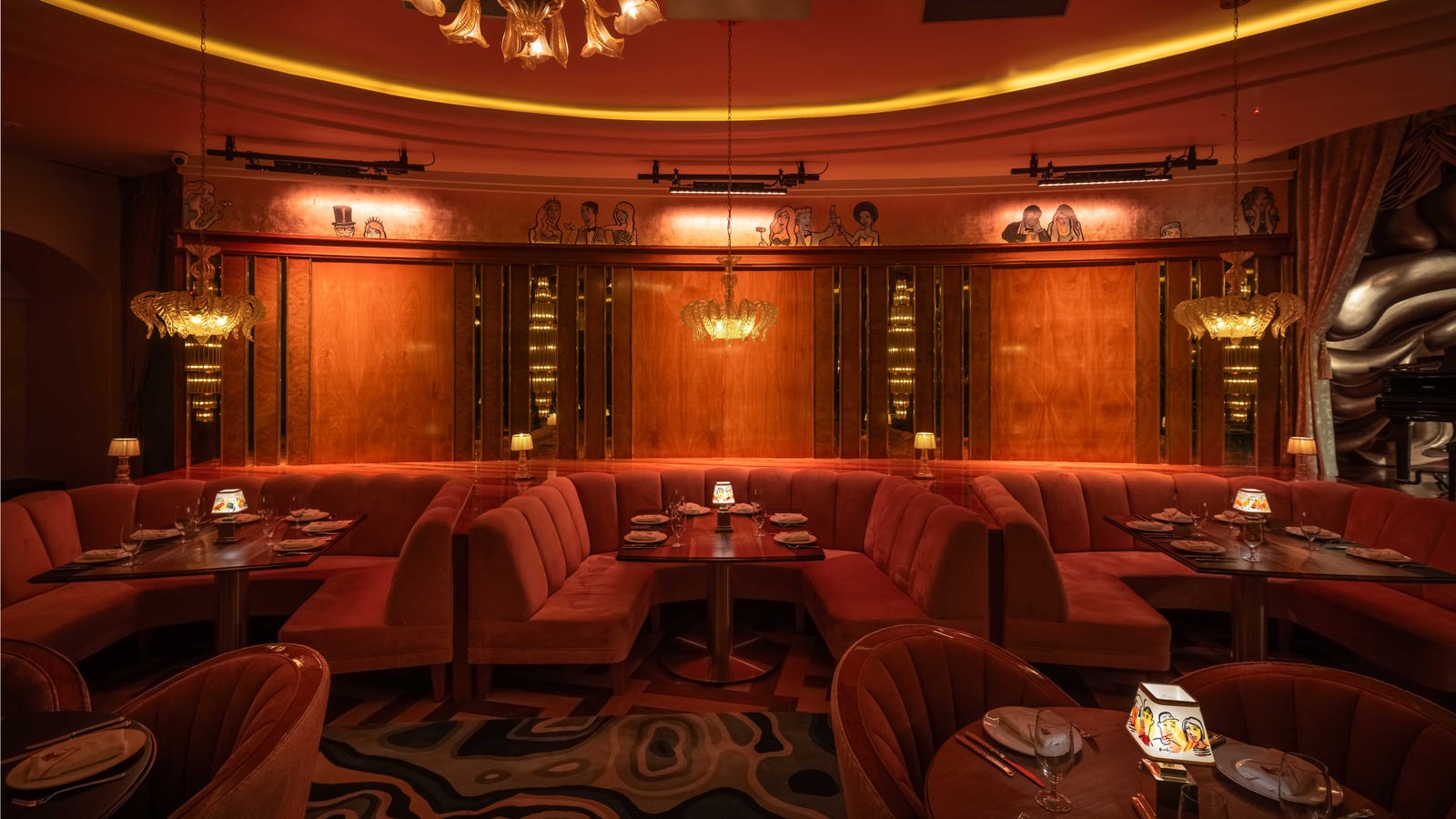 Stylish Delilah Dallas interior with plush seating and ambient lighting